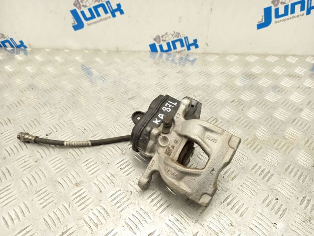 Задній гальмівний супорт лівий 8W0615403M VAG