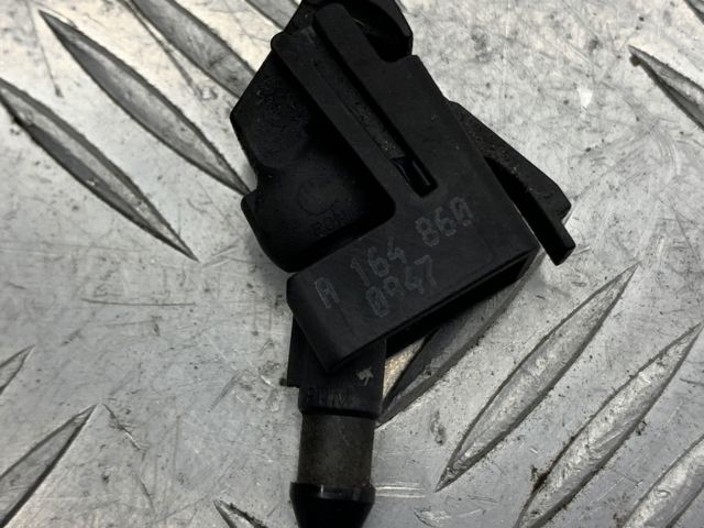Форсунка омивача скла лобового, ліва A1648600947 MERCEDES