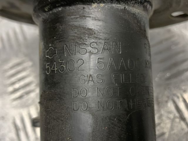 Стійка передня права E43025AA0C NISSAN