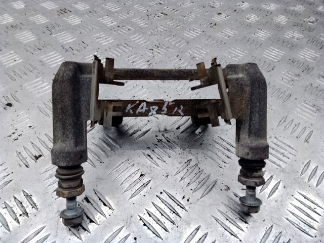 Скоба супорту заднього KAY02628X MAZDA