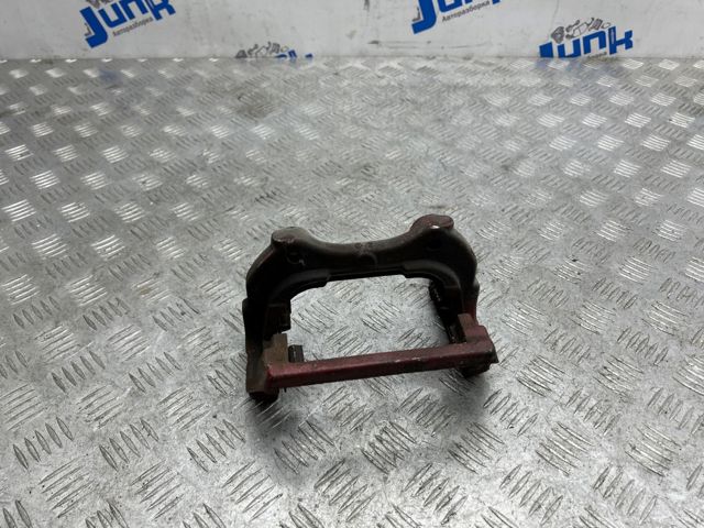Скоба гальмівного заднього супорта LR050778 LAND ROVER