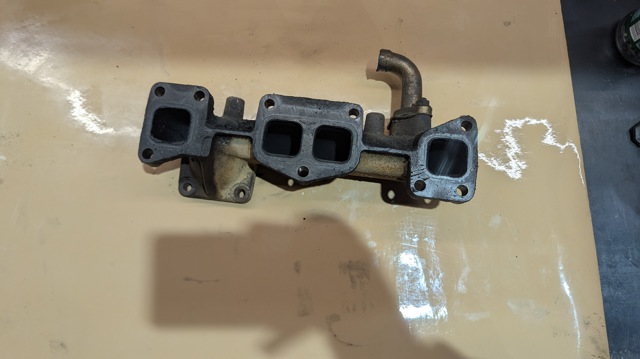 Газопроводи (колектор випускний) 1449110 FORD