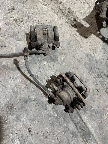 Супорт гальмівний задній правий 44001JG00A NISSAN