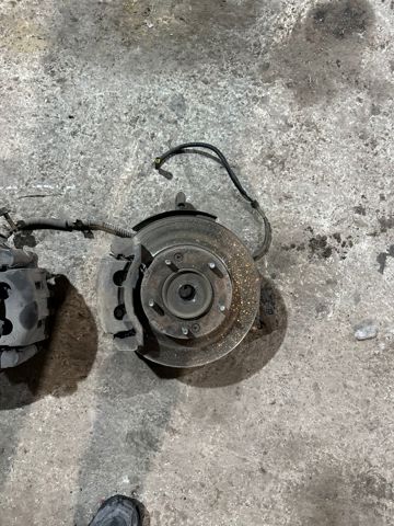 Вісь передня і поворотні кулаки 512513E201 HYUNDAI