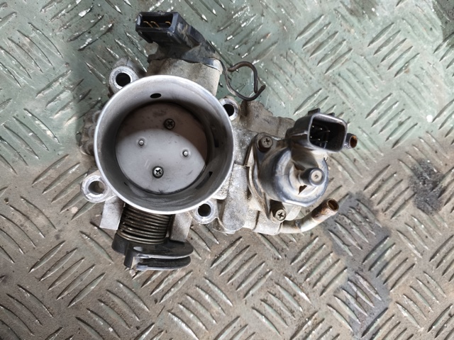 Дросільна заслінка в зборі MN153310 MITSUBISHI