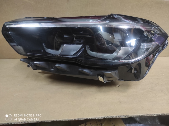Фара основна ліва 63119850411 BMW