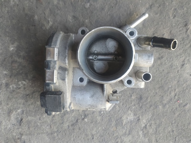 Дросільна заслінка в зборі 351002B150 HYUNDAI