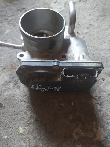 Дросільна заслінка в зборі 351002B300 HYUNDAI