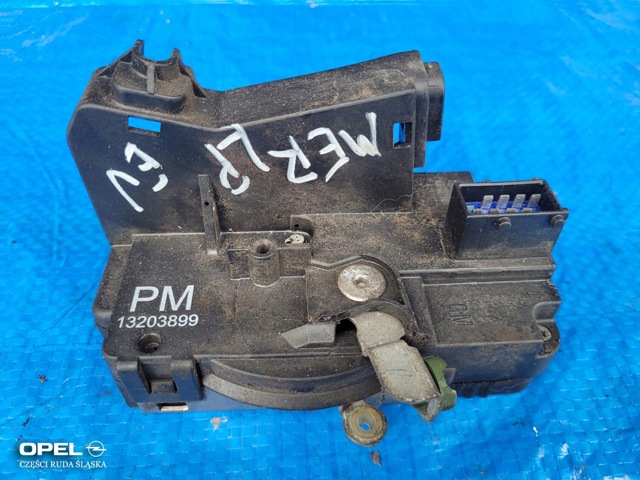 Замок дверей водія 13203899 OPEL