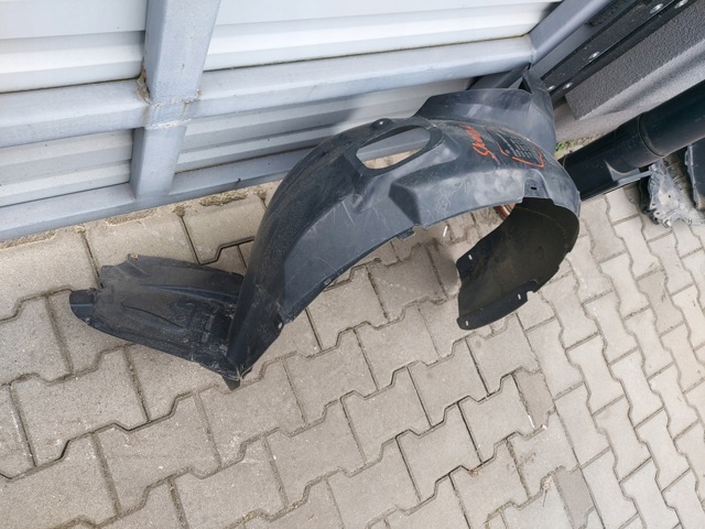Підкрилок передній лівий 5JA809957A VAG