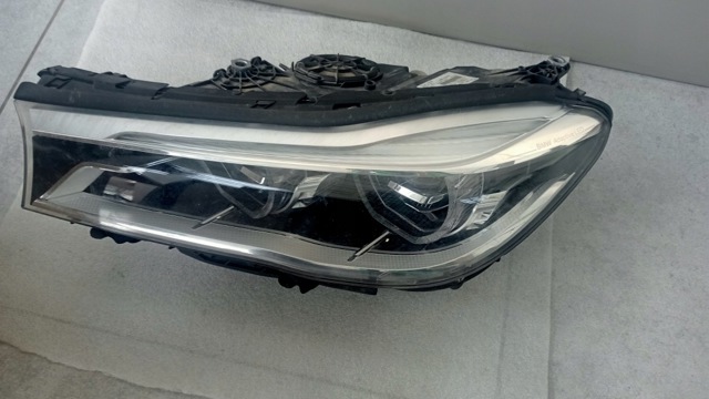 Фара ліва 63117408709 BMW
