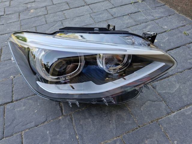 Фара передня права 7296914 BMW