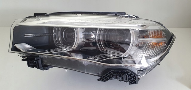 Фара ліва передня 7317101 BMW