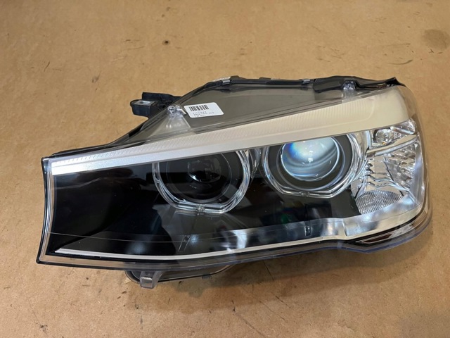 Фара ліва 7401131 BMW