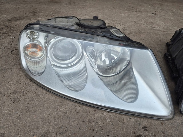 Основна фара в зборі ліва 7L6941015CE VAG
