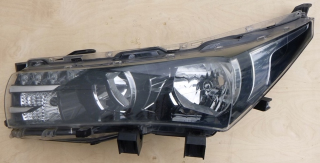 Фара ліва передня 8115002E7000 TOYOTA