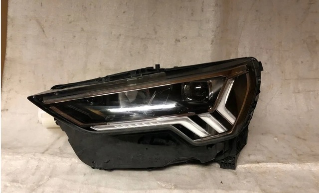 Основна фара в зборі ліва 83A941773 VAG