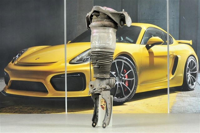 Амортизатор передньої підвіски, лівий 95534303345 PORSCHE