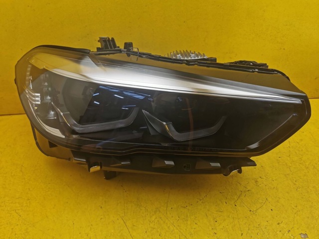 Права блок фара 9850412 BMW