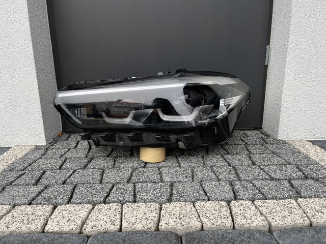 Фара ліва 9850417 BMW