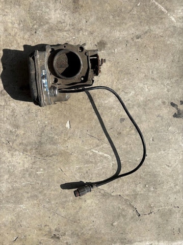 Дросільна заслінка в зборі A0001419125 MERCEDES