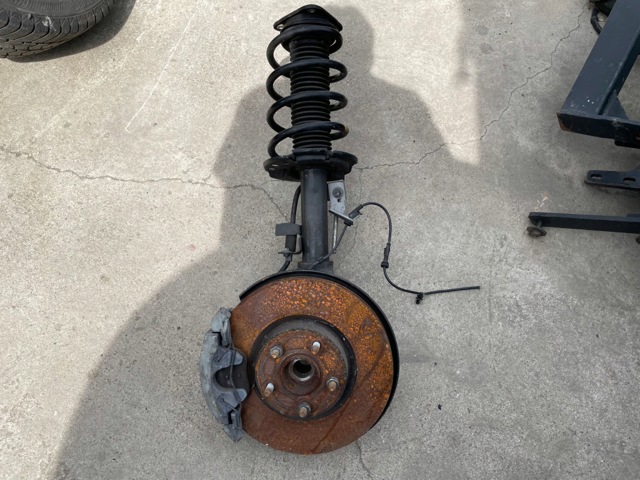 Амортизатор передній AV6118045CBE FORD