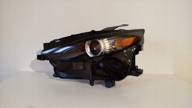 Фара основна ліва DGH951040A MAZDA
