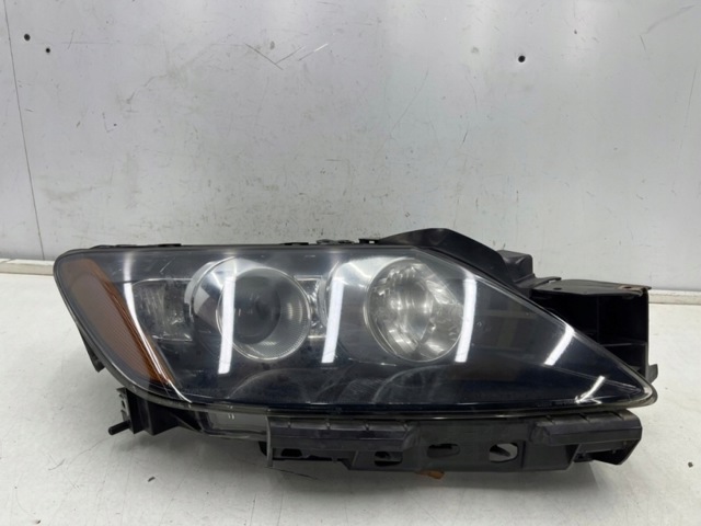 Основна фара - вставка EH1051030 MAZDA