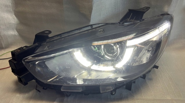 Фара ліва передня KD3151040 MAZDA