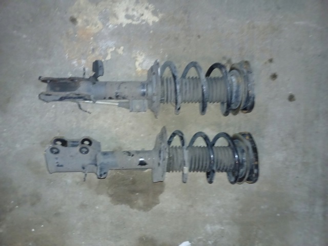Амортизатор передньої підвіски LX6118045ECD FORD