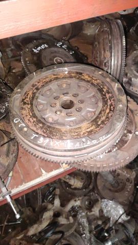 Маховик зчеплення 1231000Q1C NISSAN