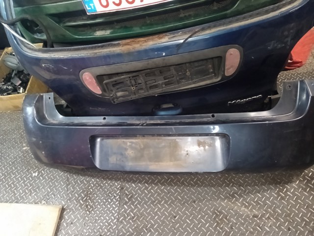 Кожух бампера заднього 1404311 OPEL