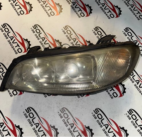 Фара передня права 24406226 OPEL