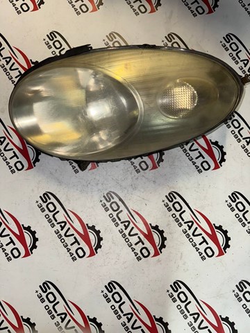 Фара ліва передня 26060AX700 NISSAN