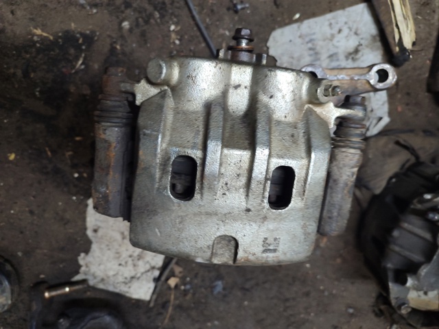 Супорт тормзной 410118H300 NISSAN
