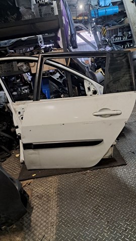Двері пасажирськи задні ліві 7751475034 RENAULT