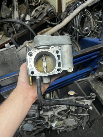 Блок дросельної заслінки 817158 OPEL