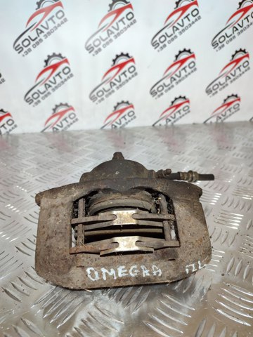 Супорт гальмівний, передній, лівий 90421744 OPEL