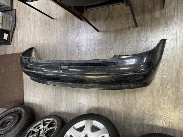 Кожух бампера заднього 90559515 OPEL