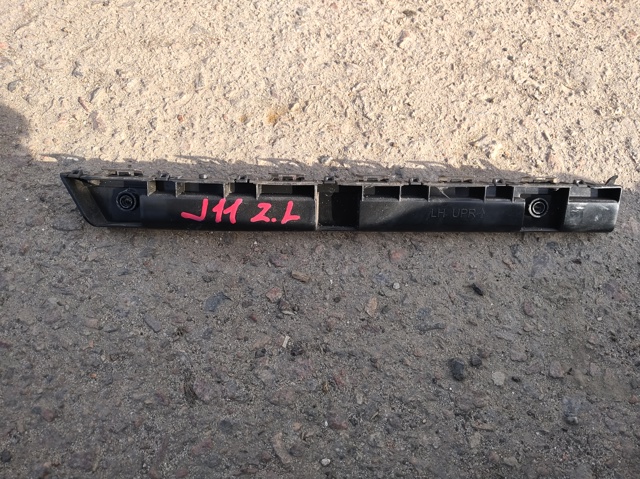 Лівий кронштейн заднього бампера 852214EA0A NISSAN