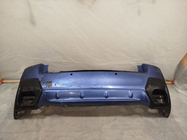 Ікло заднього бампера праве 57704FL250 SUBARU