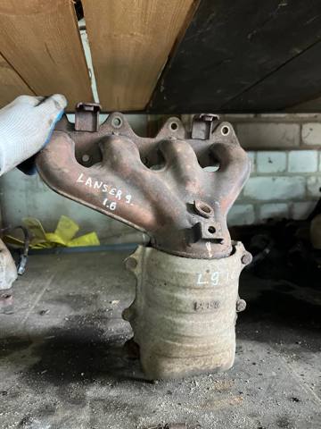 Колектор випускний 1555A412 MITSUBISHI