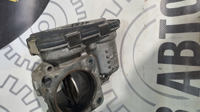 Дросільна заслінка в зборі 351002A600 HYUNDAI