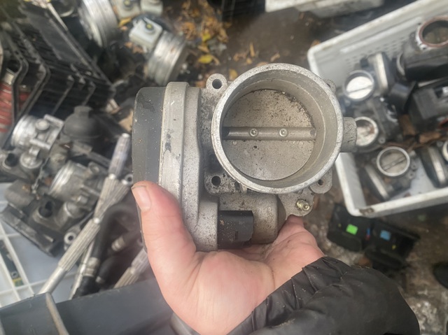 Заслінка повітряна 7502445 BMW