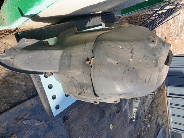 Підкрилок переднього крила, лівий задній 1K0805977 VAG