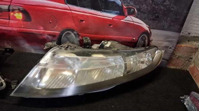 Основна фара в зборі ліва 33151SMGE01 HONDA