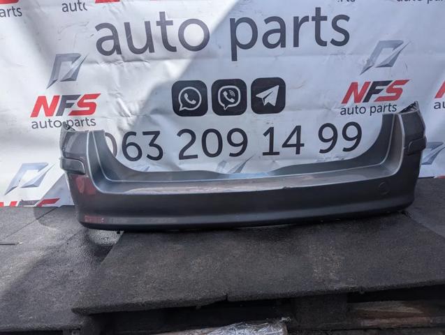 Бампер задній 332550271 OPEL