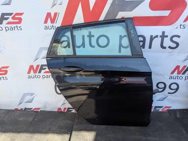 Двері задні, праві Opel Astra