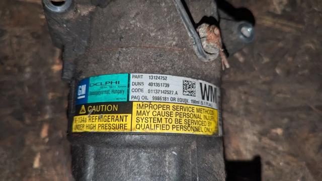 Компресор кліматичної установки 401351739 GM