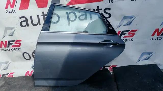 Двері задні, ліві 770033Z300 HYUNDAI